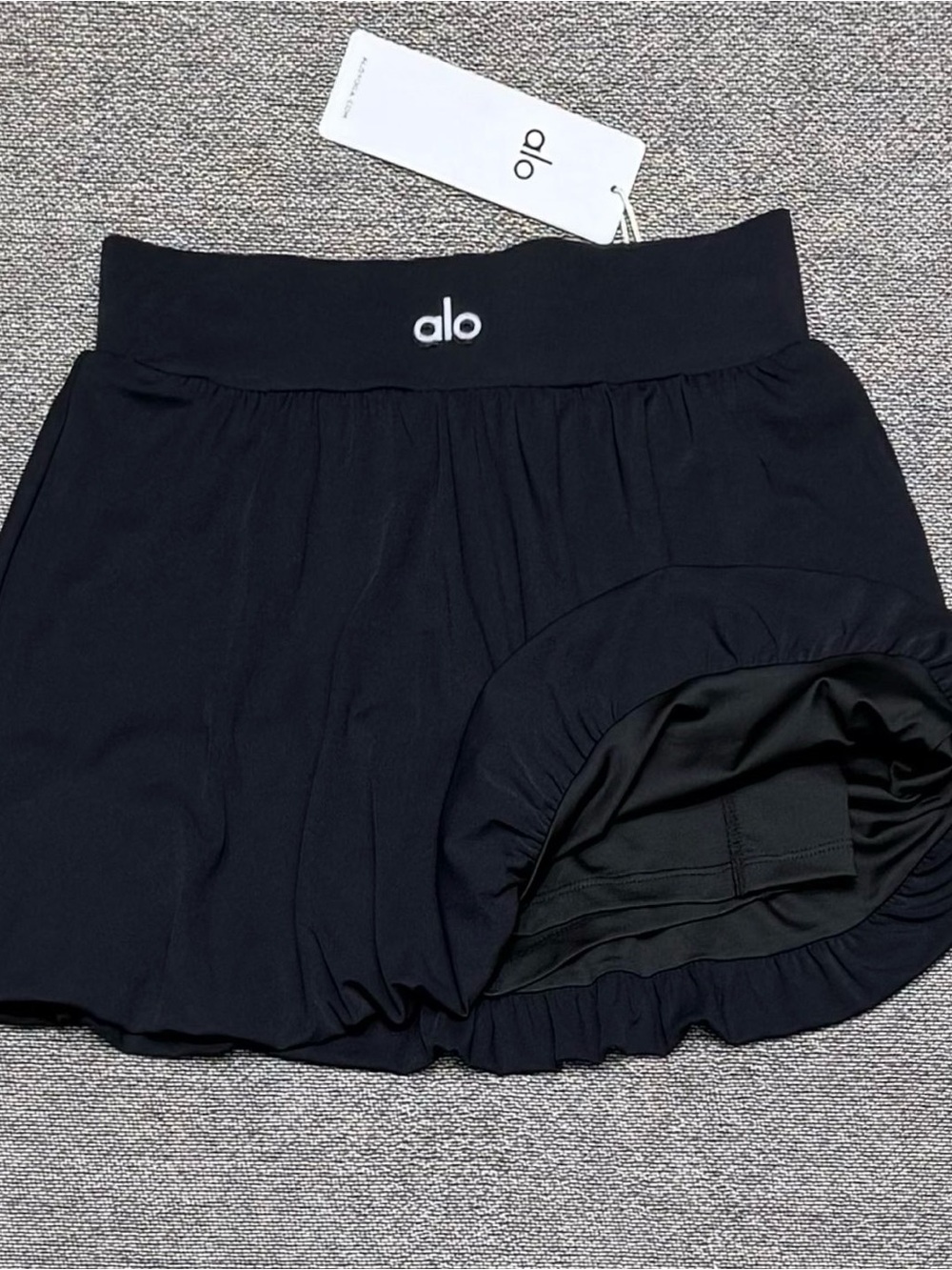 ALO Yoga Black Mini Skirt with Logo Waistband - Picture 2 of 3